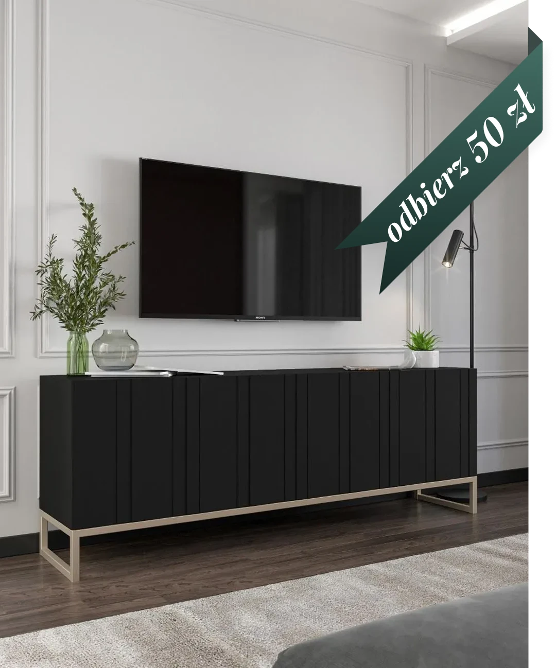Czarna nowoczesna komoda RTV na metalowych nogach pod telewizorem w eleganckim salonie – widok desktopowy